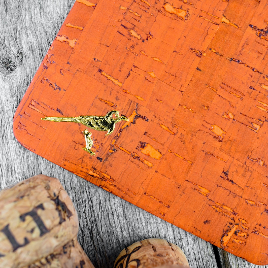 Lasinaluset oranssi valmistettu käsityönä Suomessa